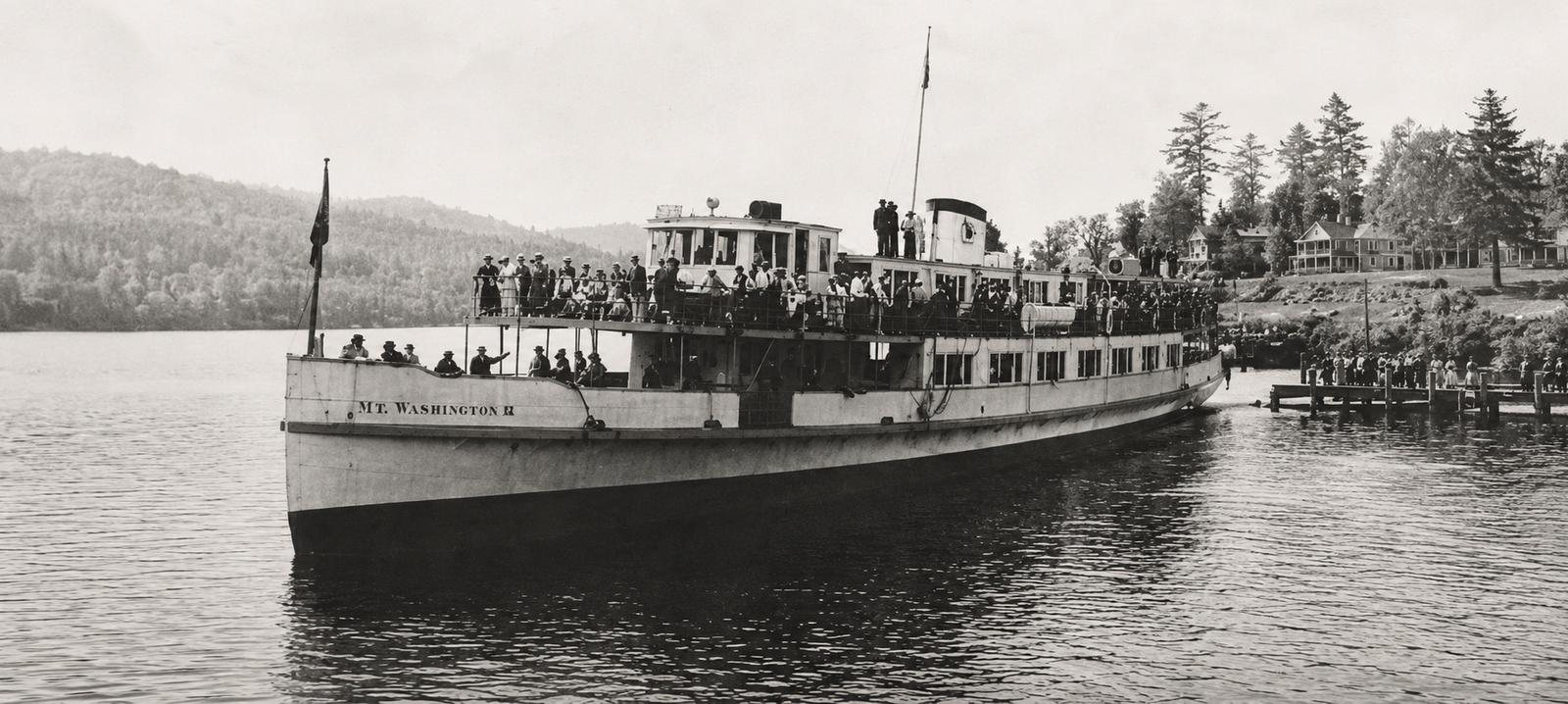 Vintage steamer on a tranquil lake